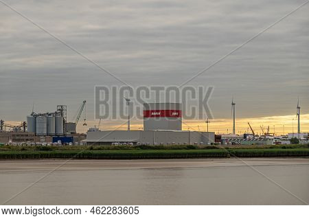 Antwerpen, Flanders, Belgium - July 10, 2022: Industry Along Scheldt River. Diamur Cement And Concre