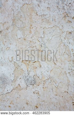 Old Whitewashed Wall With Rich And Various Texture. Cracked Plaster.