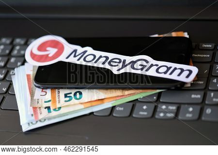 Ternopil, Ukraine - September 6, 2022 Moneygram Paper Logotype Lies On Black Laptop Keyboard With Eu
