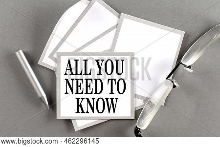 All You Need To Know Text Written On Sticky With Pencil And Glasses