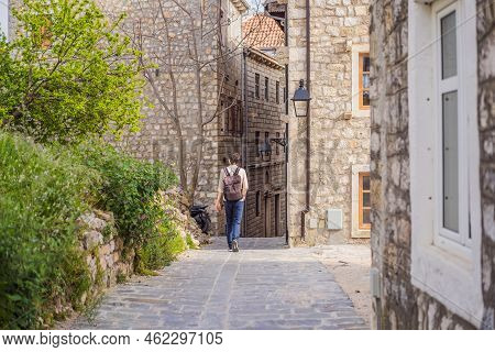The Man In Ulcinj Town In Montenegro. Clock Tower Of Ulcinj Sahat Kulla. Lami Mosque. Ulcinj Is A Po