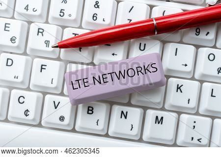 Hand Writing Sign Lte Networks. Concept Meaning Fastest Network Connection Available For Wireless Co