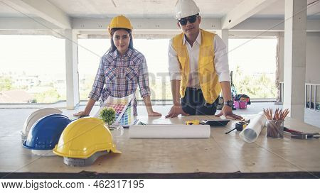 Asian Engineer Man Brainstorming Construction Building Contractor Civil Worker Parners Team Meeting 