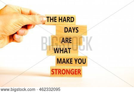 Support And Be Stronger Symbol. Concept Words The Hard Days Are What Make You Stronger On Wooden Blo