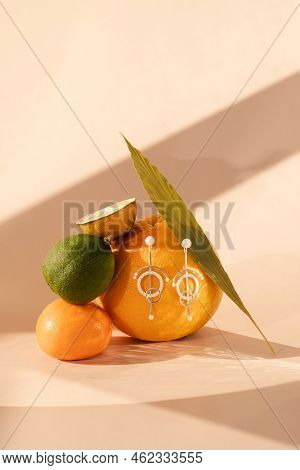 Fruits On A Stand On A Monochromatic Background