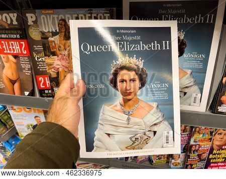 Frankfurt, Germany - Sep 24, 2022: Pov Male Hand Holding Latest Special Breaking Edition Of In Memor