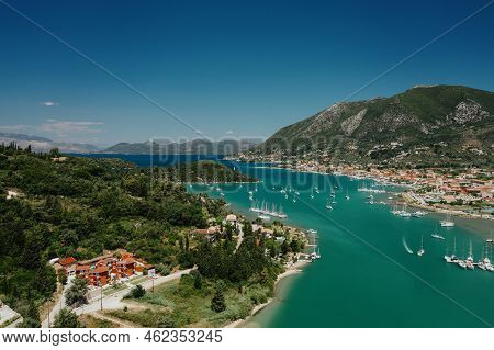 Popular Tourist Destination. Bay With Boats On Lefkada Island. Nydri Village.
