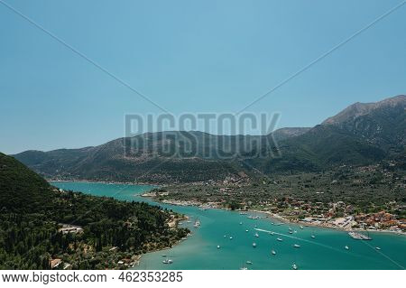 Popular Tourist Destination. Bay With Boats On Lefkada Island. Nydri Village.