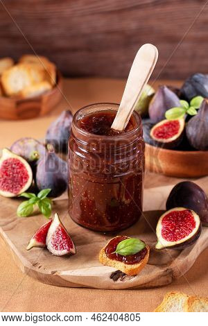 Autumn Preserves From Local Produce, Fig Jam Or Fig Marmalade On Wooden Board With Fresh, Ripe Figs,