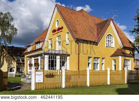 Estonia, Viljandi, September, 2022: Villa Maria Restaurant In A Yellow Renovation House With Glass V