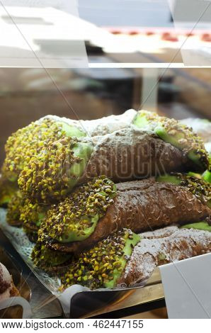 Canolli Sicilian With Pistachio Cream Traditional Italian Sweets. Cookies In The Form Of Tubes With 