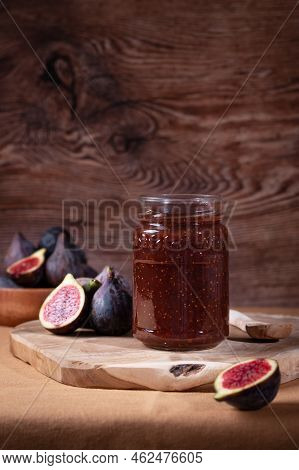 Autumn Preserves, Fig Jam Or Fig Marmalade On Wooden Board With Fresh, Ripe Figs, Still Life