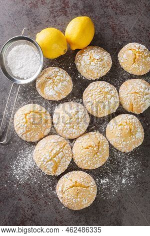 Sweet And Sour Lemon Cookies With Powdered Sugar And Zest Close-up On The Table. Vertical Top View F