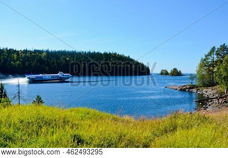 Hydrofoil Motor Ship Leaves Bay Of Valaam Island. Journey On A Sunny Summer Day