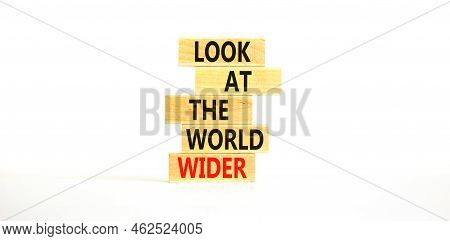Look At The World Wider Symbol. Concept Words Look At The World Wider On Wooden Blocks On A Beautifu