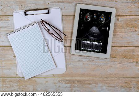 In Order To Prescribe An Effective Treatment For Patient, Doctor On Digital Tablet Reviews The Resul