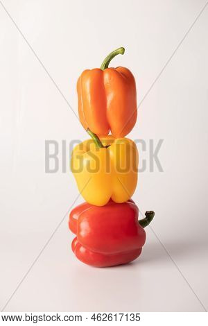 Bulgarian Pepper Of Different Colors On A White Background