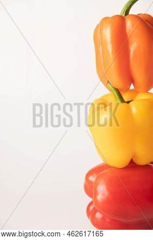 Bulgarian Pepper Of Different Colors On A White Background