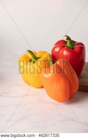 Bulgarian Pepper Of Different Colors On A White Background