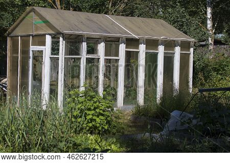 Glass Greenhouse For Growing Vegetables. Glass Window Frames