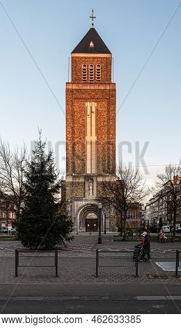 Jette, Brussels Capital Region, Belgium, 12 20 2020 - Our Lady Of Lourdes Church And Rectangular Tow