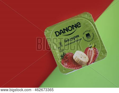 September 25, 2022 Ukraine City Of Kyiv Danone Yogurt On A Colored Background