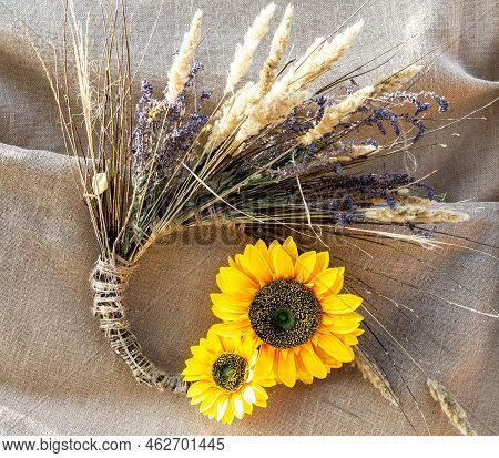 Decorative сomposition Of Dry Grass, Flowers And Sunflowers