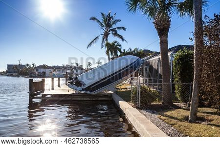 Naples, Florida, Usa - September 28, 2022: News - Flipped Boat Pushed On Land During Hurricane Ian S