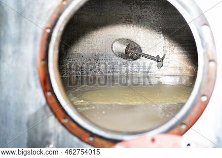 Vat With Fermentation Braga Of The Distillery. View Of Braga