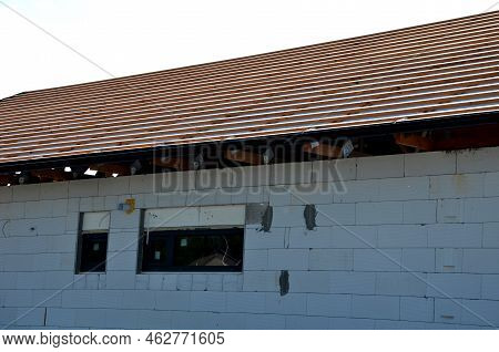 The Trusses Are Made From High-quality, Strength-graded Lumber And Connected By Steel Buttplates Wit