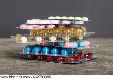 Too Many Different Pill Cartridges Stacked. Selective Focus. Packs Of Blister Pills With Tablets. Co