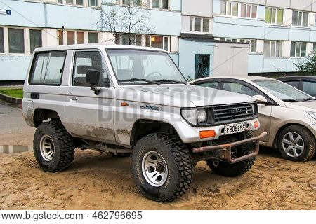 Novyy Urengoy, Russia - August 7, 2012: Grey Offroad Car Toyota Land Cruiser Prado 70 In A City Stre