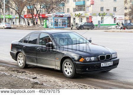 Ufa, Russia - March 5, 2012: Black Saloon Car Bmw 5-series (e39) In A City Street.