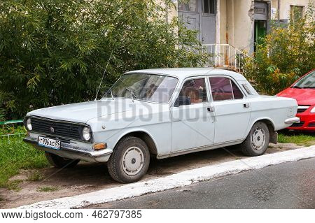Nadym, Russia - August 29, 2021: Old Soviet Sedan Gaz-24-10 Volga In A City Street.
