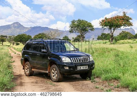 Taita Hills, Kenya - February 3, 2021: Black Offroad Car Toyota Land Cruiser Prado 120 In The Tsavo 