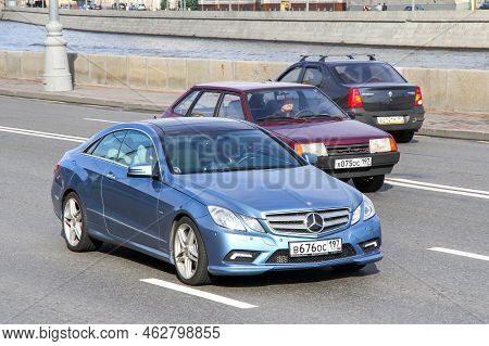 Moscow, Russia - June 3, 2012: Cyan Coupe Car Mercedes-benz E-class (c207) In The City Street.