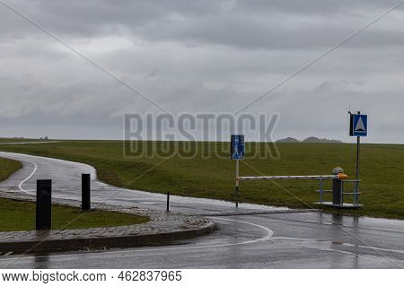 Lowered Barrier At The Checkpoint On The Road. Checkpoint On The Road