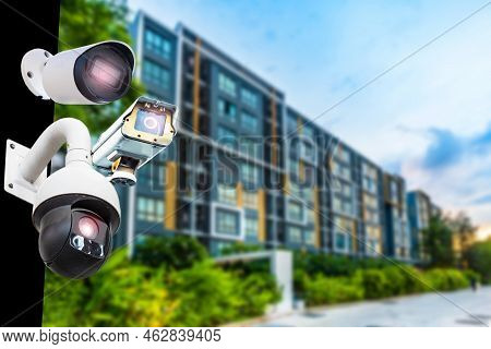 Multi-angle Cctv System On Condos, Corridors, Residential Houses, Blurred Background Poles, Backgrou