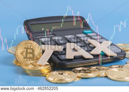 Tax Btc Cryptocurrency With Tax Wording On Bitcoin And Caculator On Stock Graph Yellow Background