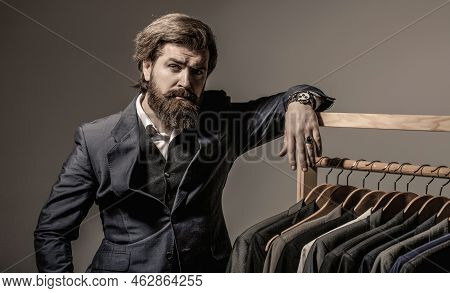 Male Suits Hanging In A Row. Men Clothing, Boutiques. Man Suit, Tailor In His. Tailor, Tailoring