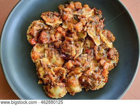Spinach And Ricotta Agnolotti In A Rich Sauce
