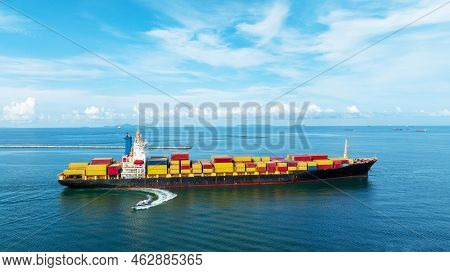 Side Of Cargo Ship Carrying Container And Running