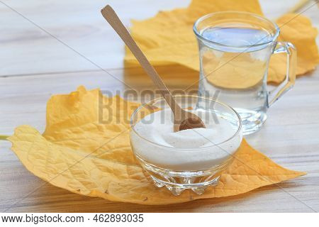 Collagen Powder In Bowl And Glass Of Water. Collagen With Antiaging And Beauty Effects, Good For Joi