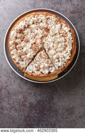 Sweet Pie With A Filling Based On Rice Pudding Topped With Whipped Cream And Chocolate Chips Close-u