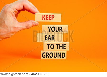 Keep Your Ear To The Ground Symbol. Concept Words Keep Your Ear On The Ground On Wooden Blocks. Busi