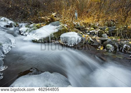 Russia. The South Of Western Siberia, The Altai Mountains. Stormy Streams Of Water Ice On The Karasu