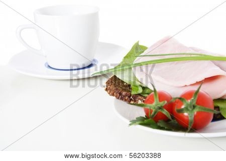 Fine served granary bread with boiled ham. All on white background.