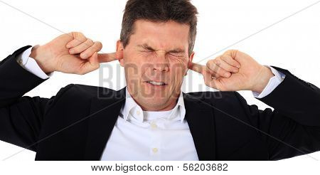 Attractive middle-aged man suffering from tinnitus. All on white background.