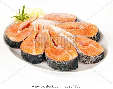 Raw Salmon Steaks On A Plate