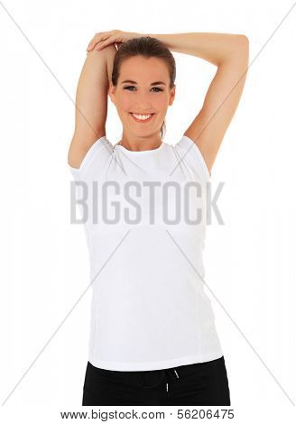 Attractive young woman in sports wear doing stretching exercise. All on white background.